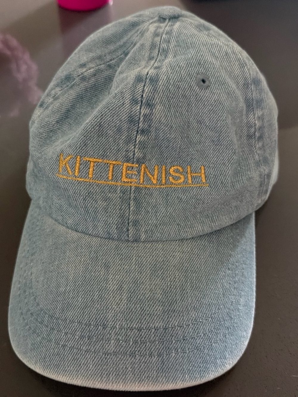 Kittenish Light Blue Denim Cap with Yellow Embroidered Logo